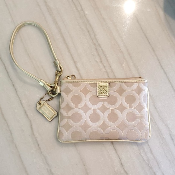 Coach Handbags - Coach Julia Op Art Gold Metallic Wristlet